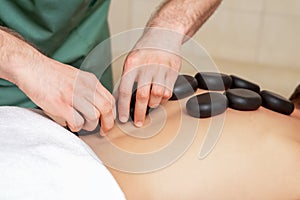 Man getting a hot stone massage