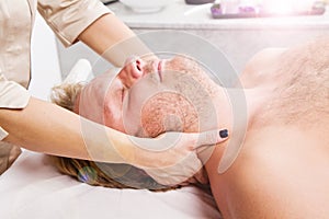 Man getting massage in thebeauty center