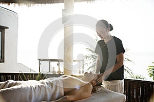 Man getting a message at a spa