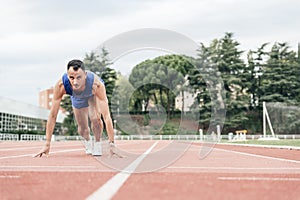 Man getting ready to start running.