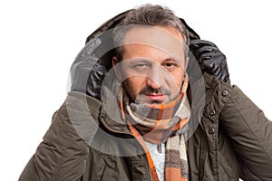 Man getting ready for winter with hood