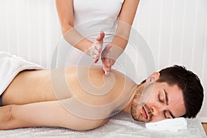 Man getting spa treatment