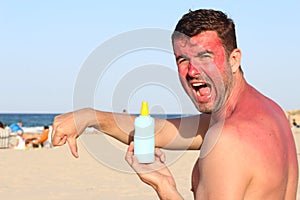 Man getting sunburned at the beach