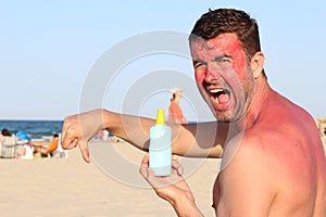 Man getting sunburned at the beach