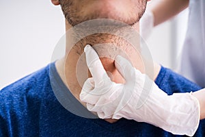 Man Getting Thyroid Gland Control