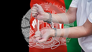 A man getting under arrest in Afghanistan. Concept of being handcuffed, detained, incarcerated and jailed in said country.