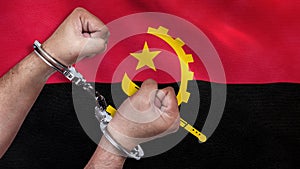 A man getting under arrest in Angola. Concept of being handcuffed, detained, incarcerated and jailed in said country. National law