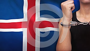 A man getting under arrest in Iceland. Concept of being handcuffed, detained, incarcerated and jailed in said country. National