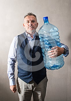 Man with a giant water bottle