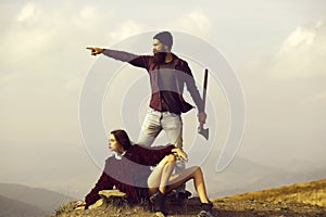 Man and girl on mountain