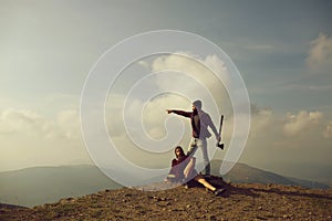 Man and girl on mountain