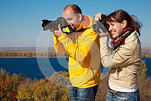 Man and girl photographed outdoors, autumn