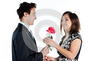 Man gives a woman flowers