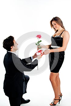 Man gives a woman flowers