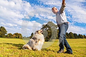 Man giving command to his dog
