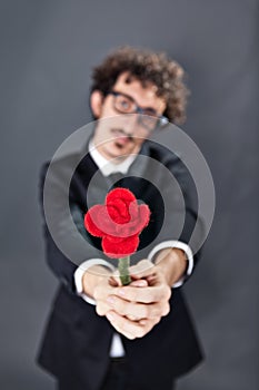 Man giving fabric rose