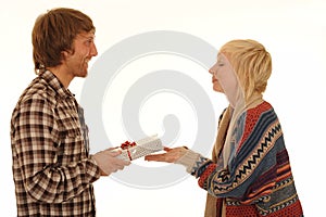 Man giving girlfriend present