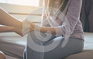 Man giving hand to depressed woman patient,Personal development including life coaching therapy sessions and speech therapy,Mental