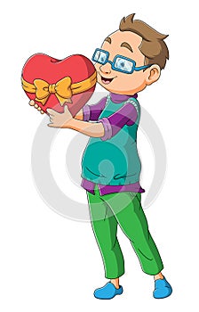 The man is giving a love chocolate