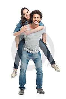 Man Giving Piggyback Ride To Her Girlfriend