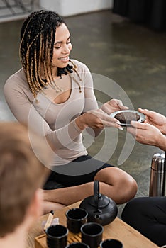 man giving plate with compressed puer