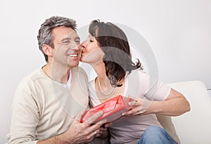 Man giving a present to woman