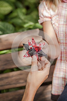 Man giving to his girlfriend a surprice