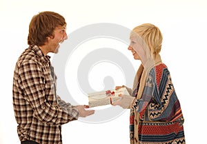 Man giving woman present