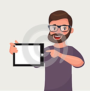 Man in glasses with beard is showing the tablet PC. People and gadgets