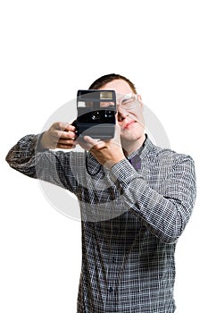 Man in glasses with old style camera