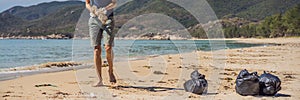 Man in gloves pick up plastic bags that pollute sea. Problem of spilled rubbish trash garbage on the beach sand caused