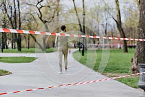 The man goes behind the security tape. Violation of the ban on walking in public places