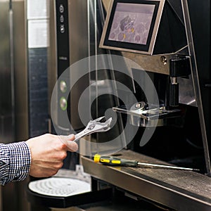 Man going to prerare coffee maker