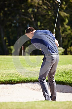 Man, golf and club for sports and swing for fitness, practice and hobby in summer outdoor. Golfer or mature male with