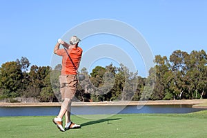 Man golfing photo