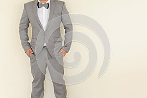 A man in gray suit