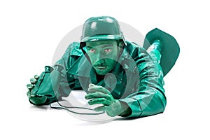 Man on a green toy soldier costume