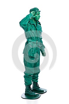 Man on a green toy soldier costume