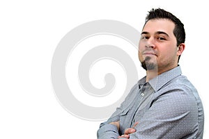Man in Grey Shiirt Crossing arms and Smiling Copyspace