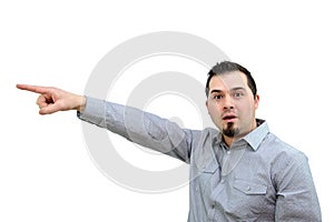 Man in Grey Shirt pointing Expressively on white backdrop