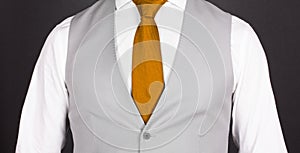 Man in a grey suit, close-up