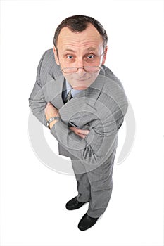 Man in grey suit watching