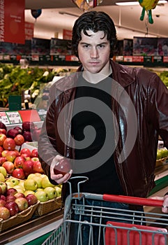 Man grocery shopping