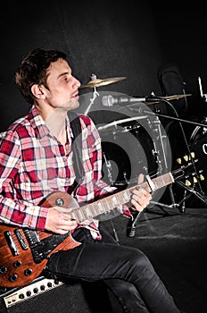 Man with guitar during photo