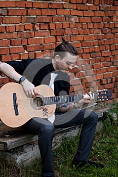 Stylish man with guitar photo