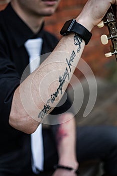 Stylish man with guitar photo