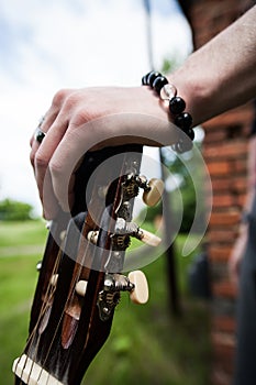 Stylish man with guitar photo