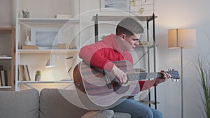 man guitarist musical leisure playing chords home