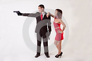 Man With Guns and Attractive Woman