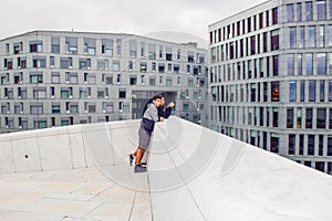 Man and guy on the roof of Oslo Opera House. Norway